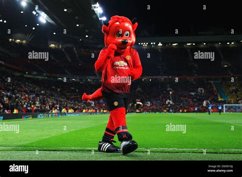 Manchester United mascot Fred the Red greets the crowd at half time ...