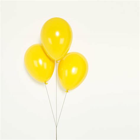 Yellow Balloons Stock Photos, Pictures & Royalty-Free Images - iStock