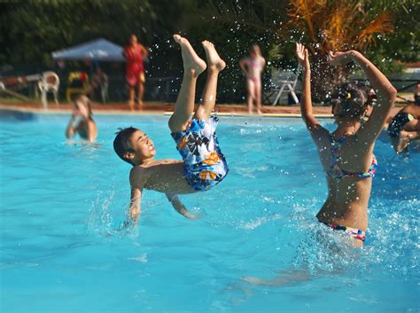 people playing in swimming pool | Swimming pool water, Swimming pools, Pool