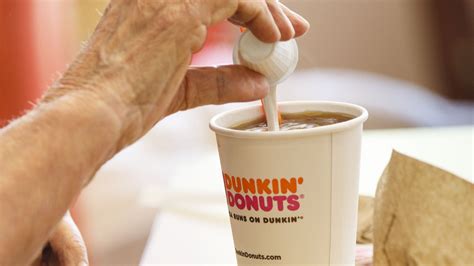 The Truth About How Much Cream Dunkin' Puts In Your Coffee