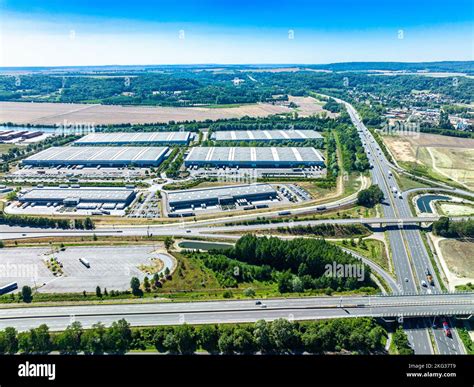 Aerial view of industrial city zone near national freeway Stock Photo - Alamy