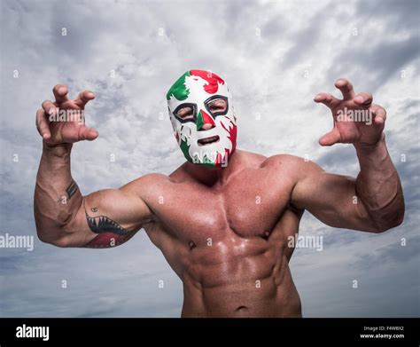 Large male muscular Wrestler with Mexican flag wrestling mask Stock ...