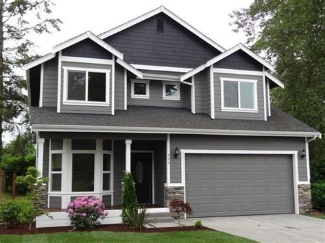 paint idea... dark grey on top w/ white trim | Gray house exterior ...