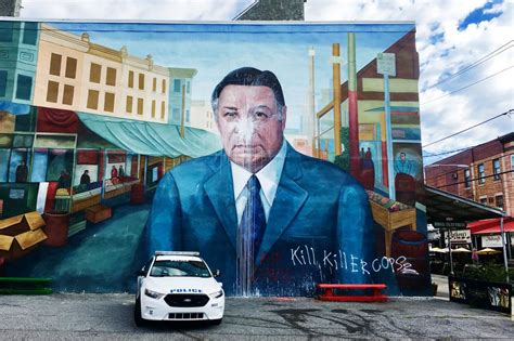 Italian Market stuck in the middle with Frank Rizzo mural