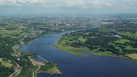 5.5K stock footage aerial video approach Erskine Bridge spanning River Clyde, Glasgow, Scotland ...