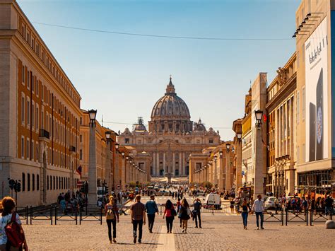 Download People Walking In Vatican City Wallpaper | Wallpapers.com