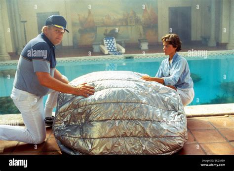 COCOON (1985) BRIAN DENNEHY, TAHNEE WELCH COCN 001 Stock Photo - Alamy