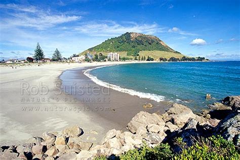 Mount Maunganui (232m) Mauao, and Mount Maunganui beach from Moturiki Island, Mt Maunganui ...