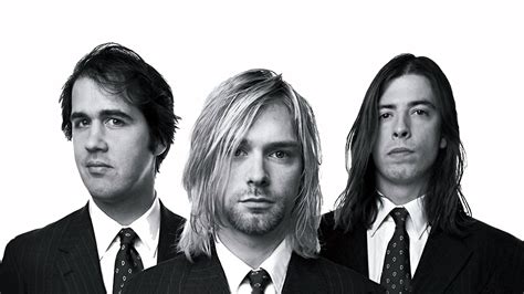 A Look Back at the Band that Rocked the 90s: Nirvana - MaxxMusic90s