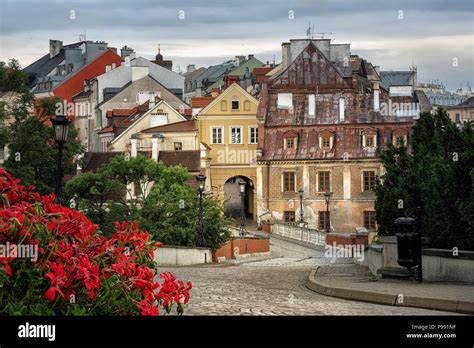 View of old town of Lublin from Lublin Castle with red flowers on foreground, Poland Stock Photo ...