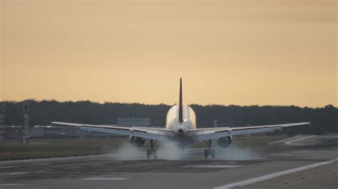 Airplane landing at golden sunset 7388089 Stock Video at Vecteezy