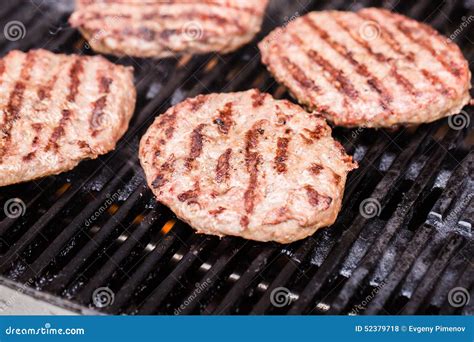 Preparing a Batch of Grilled Ground Beef Patties Stock Photo - Image of ...