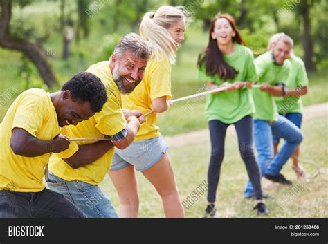 Two Teams Tug--war Image & Photo (Free Trial) | Bigstock