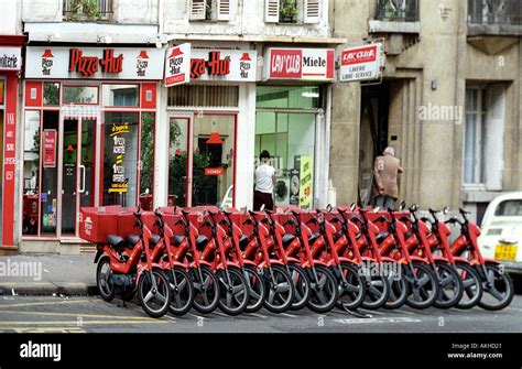 Pizza delivery bikes lined up outside Pizza Hut in Paris France Stock Photo - Alamy