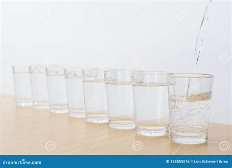 Eight Glasses Of Water A Day - Ocho Vasos De Agua Stock Photo - Image ...