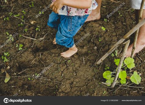 Bare Feet Children Playing Mud Stock Photo by ©joaquincorbalan 210632090