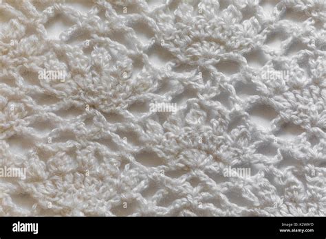 White handmade lace tablecloth texture on white background Stock Photo ...