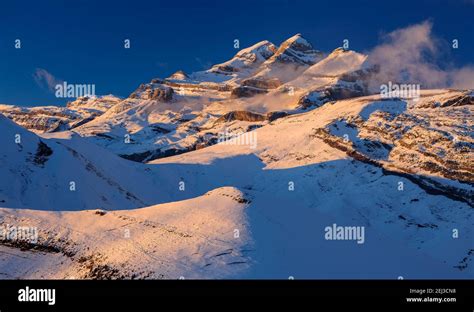 Winter sunset at Monte Perdido summit and Soum de Ramond and Punta de las Olas peaks (Ordesa and ...