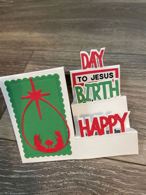 two christmas cards with the words happy and to jesus birth on them ...