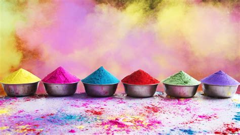 Holi colours are kept in the pots for the peoples 2K wallpaper download