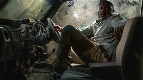 Idris Elba Punches Revenge Driven Lion in BEAST Trailer - Nerdist