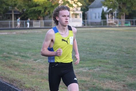 14-year-old Marcus Reilly runs a world-record mile in Fairhaven