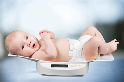 Premium Photo | Baby weight scale weight scale child healthcare and ...