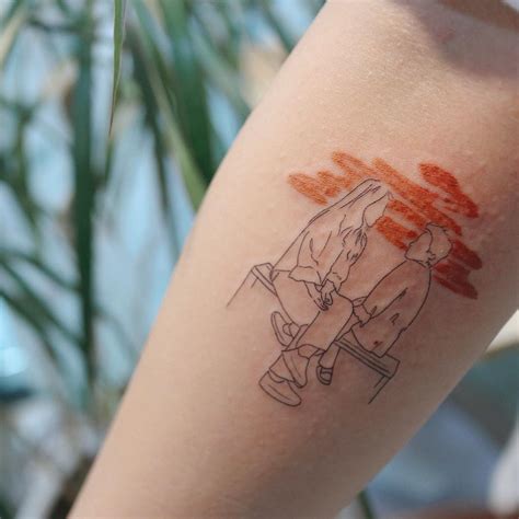 Tattoo_joojoo realizes minimal tattoos with a touch of color | Collater.al