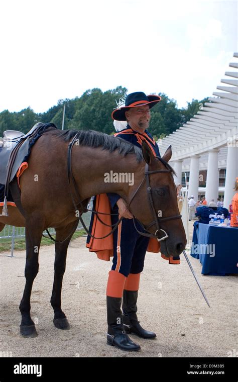 The Virginia Cavaliers mascot and his horse Sabre posed stands at Scott ...