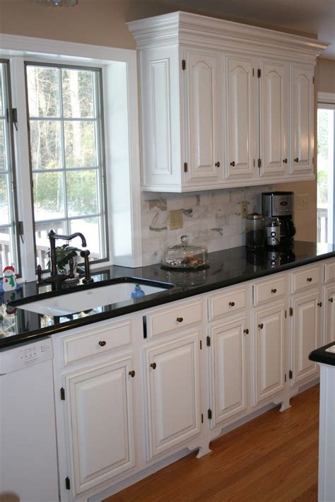 cabinets | Black kitchen countertops, Best kitchen cabinets, White cabinets black countertops