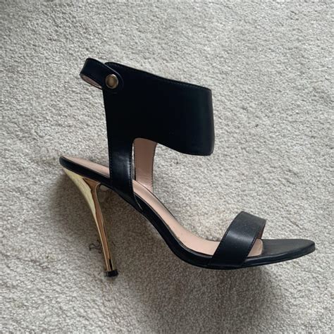 Carvela black ankle strap heels with gold heel, worn... - Depop