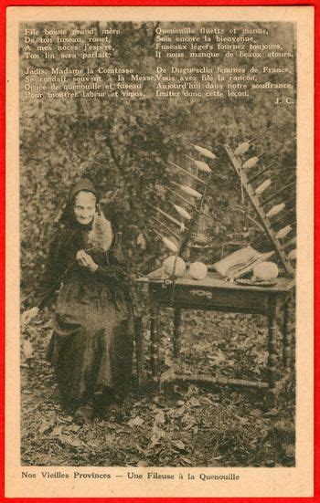 Old French postcard shows elderly woman spinning. Beside her on the table is a spindle rack with ...