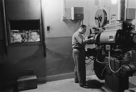 File:Man working with a projector in a movie theater 1958.jpg