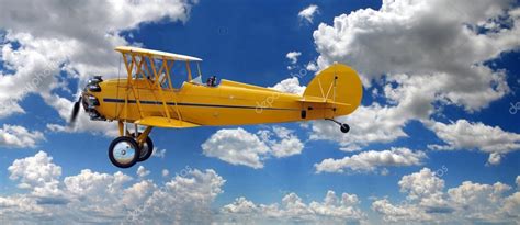 Vintage Biplane Over Clouds — Stock Photo © ginosphotos1 #15394163