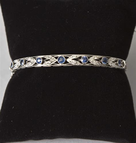 Vintage Platinum, Diamond & Saphire Bangle Bracelet | Cottone Auctions