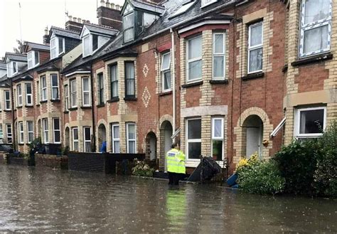 An entire town shut down due to flash floods as water levels reached up to waist-high