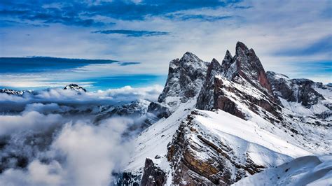 Seceda Mountain in Winter 4K Wallpaper - Elevate Your Screen with High-Quality Wallpapers