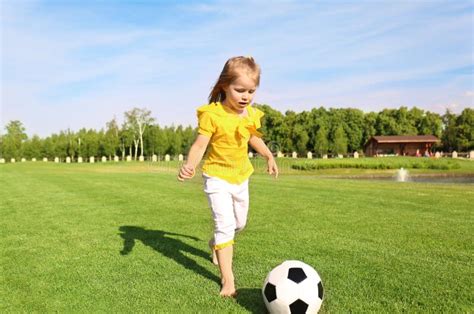 Girl playing football stock image. Image of competition - 1839701