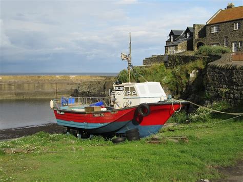 "Craster Harbour" by lezvee | Redbubble