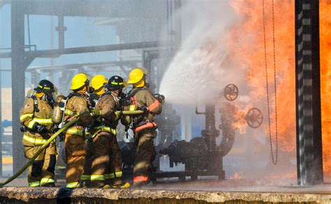 Fire fighters battling a blaze at oil pipeline refinery - Wilkinson Coutts Engineering Training Ltd