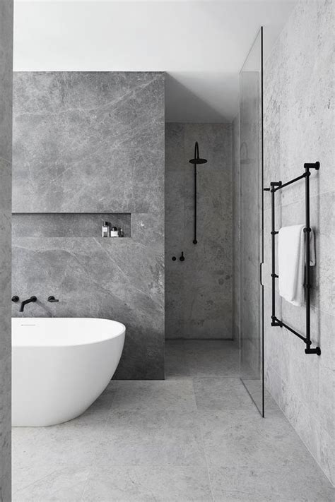 10 Stunning Stone Tile Bathroom Designs That Made Our Editors Do A Double Take | Bathroom tile ...