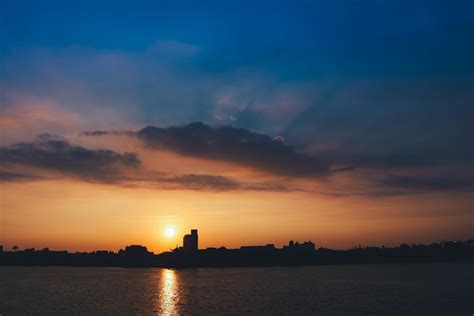 Silhouette of City Buildings during Sunset · Free Stock Photo