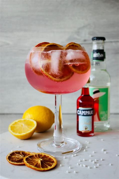 Campari Gin And Tonic Cocktail - Food & Sun | Recipe in 2021 | Gin and tonic, Campari, Cocktail ...