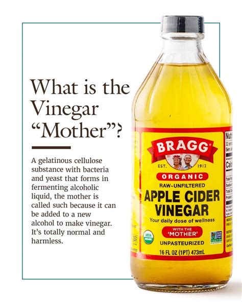 a bottle of apple cider vinegar sitting on top of a white background ...