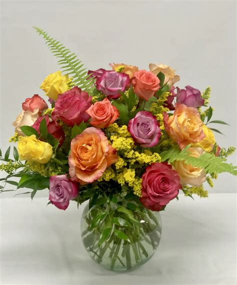 Two dozen premium Ecuadorian roses in assorted complimentary colors ...