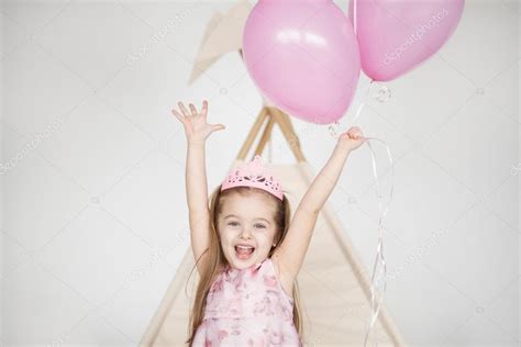 Excited kid celebrating her birthday — Stock Photo © kegfire #116632996