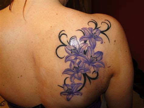 Pin by Tattoos More And Ideas on Tattoos on back | Flower tattoo shoulder, Lily tattoo, Shoulder ...