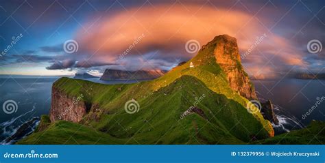 Kallur Lighthouse On Green Hills Of Kalsoy Island Stock Photography | CartoonDealer.com #182085914