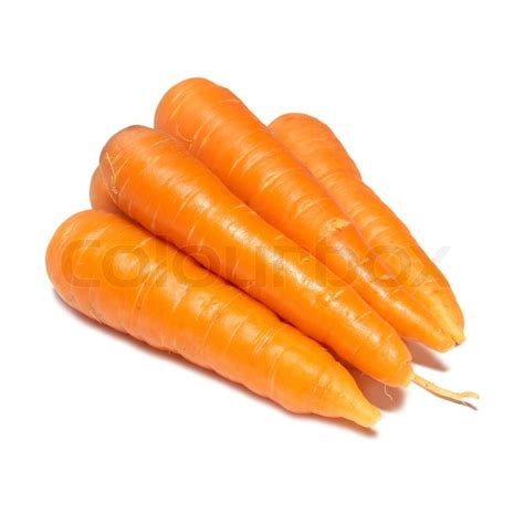 Orange carrots isolated on the white ... | Stock image | Colourbox