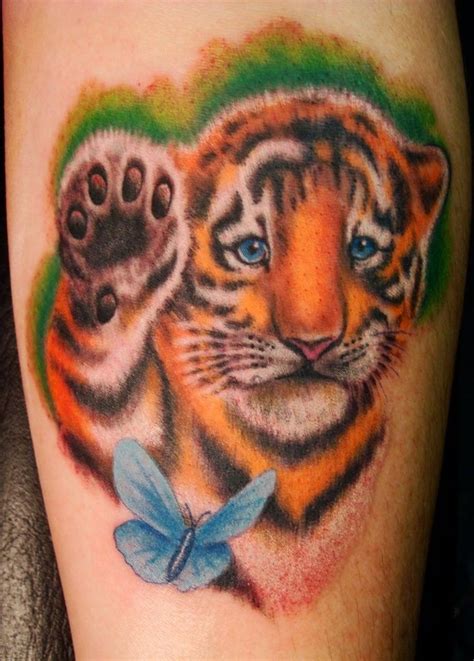 Tiger cub with butterfly in color tattoo Tiger Butterfly Tattoo ...